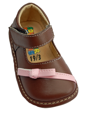 Brown with pink ribbon-